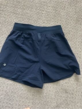 Lululemon License To Train High Rise Shorts 4” navy blue size 6